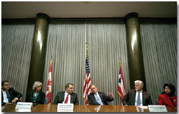 President George W. Bush meets with labor leaders to discuss America's energy policy at the International Brotherhood of Teamsters headquarters in Washington, D.C., Jan. 17, 2001. From left to right, sitting with the President are Secretary of Energy Spencer Abraham, Secretary of the Interior Gale Norton, President of the Teamsters union James P. Hoffa, President of the United Brotherhood of Carpenters Doug McCarron and Secretary of Labor Elaine Chao. 